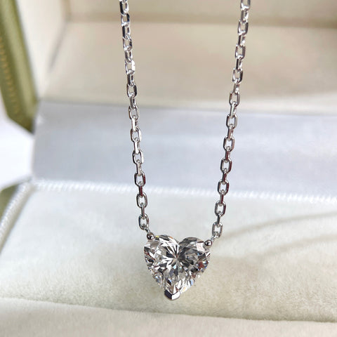 Jewelry display of a 1.51 carat heart-shaped lab grown diamond necklace in 18K white gold.