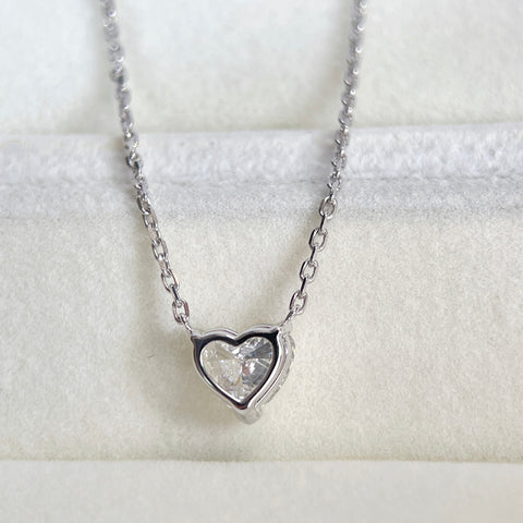 Back view showing the setting of a 1.51 carat heart-shaped lab grown diamond necklace in 18K white gold.