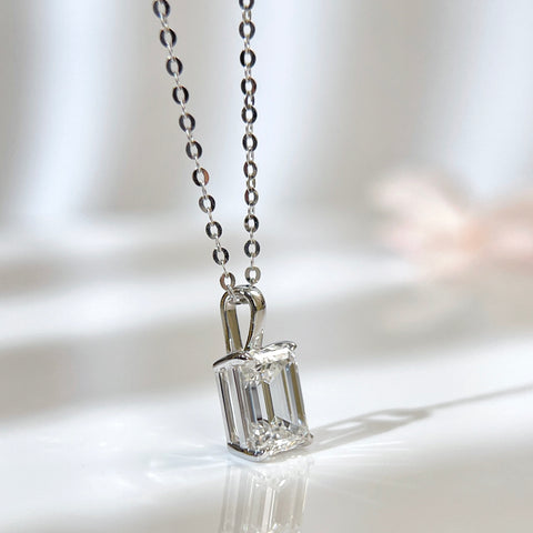 1.5 ct emerald-cut lab grown diamond pendant in 14K white gold styled on a chain