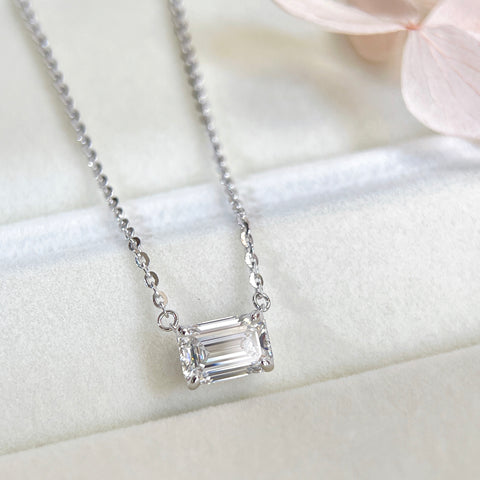 Emerald-cut lab grown diamond sterling silver necklace displayed in a jewelry box