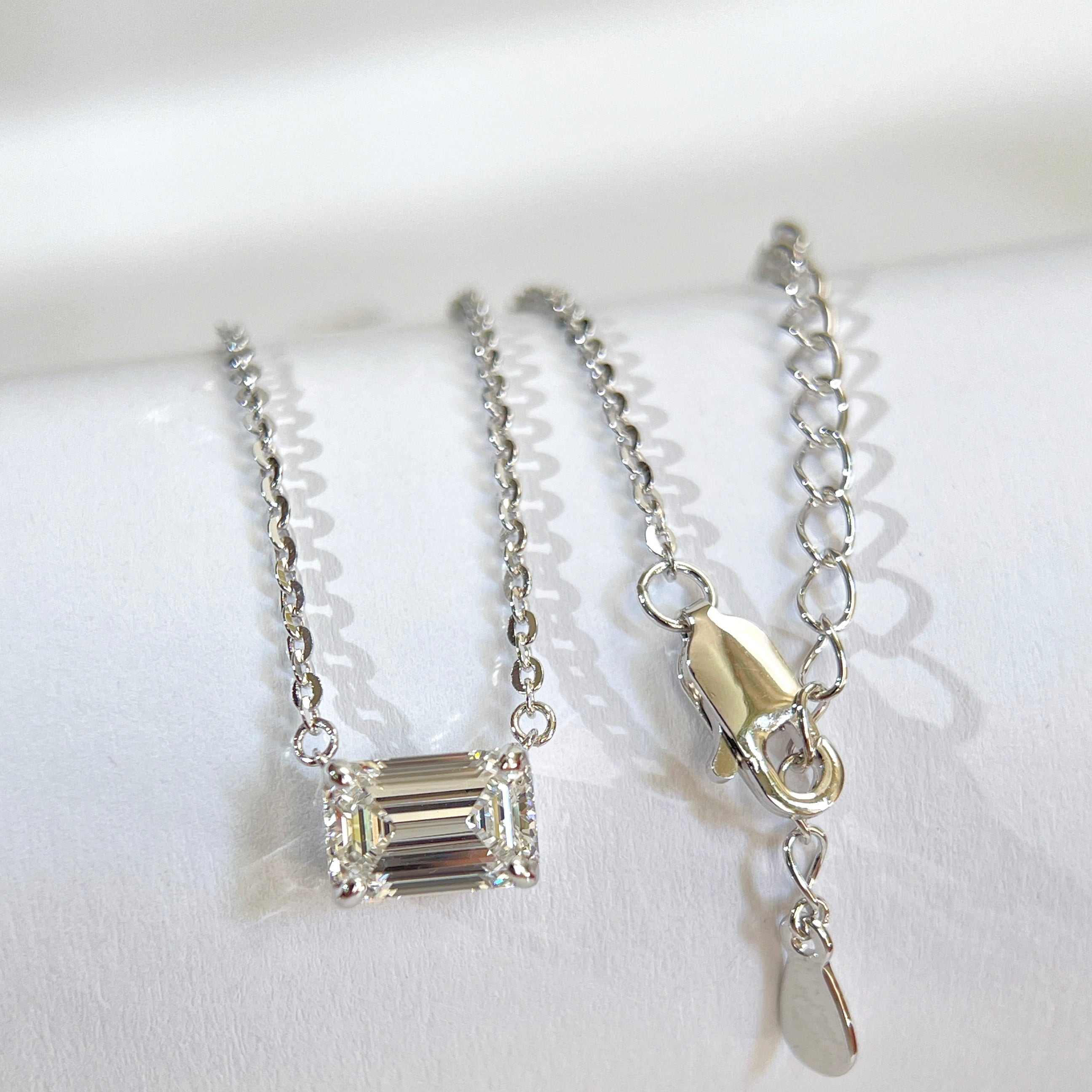 Sterling silver emerald-cut lab grown diamond necklace with clasp and adjustable extension chain