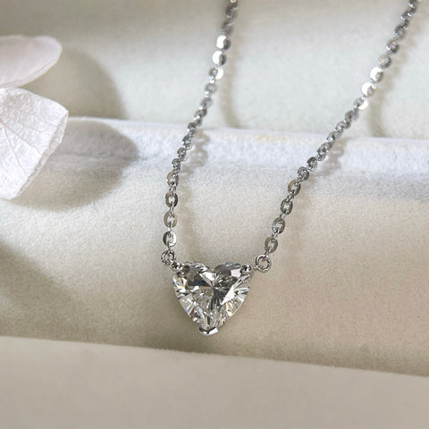 Jewelry display of a 1.5 carat heart-shaped lab grown diamond necklace in S925 sterling silver.