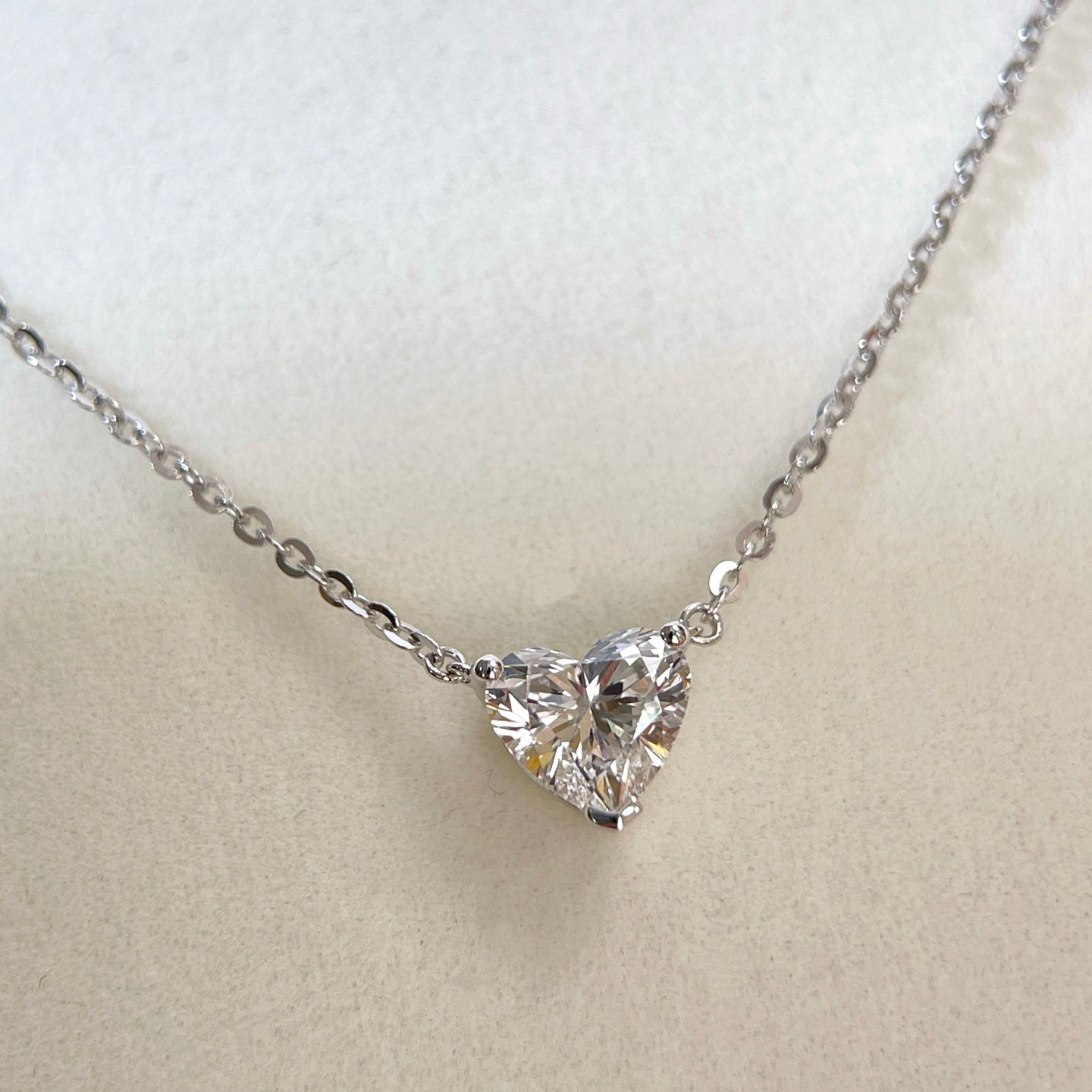 Front view of a 1.5 carat heart-shaped lab grown diamond necklace in S925 sterling silver.