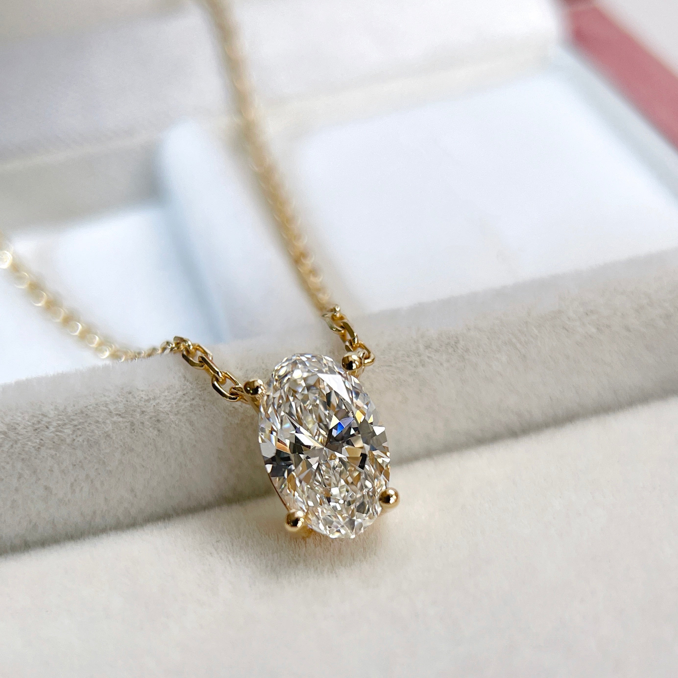 IGI certified 1.5 carat oval lab-grown diamond necklace in 18K yellow gold