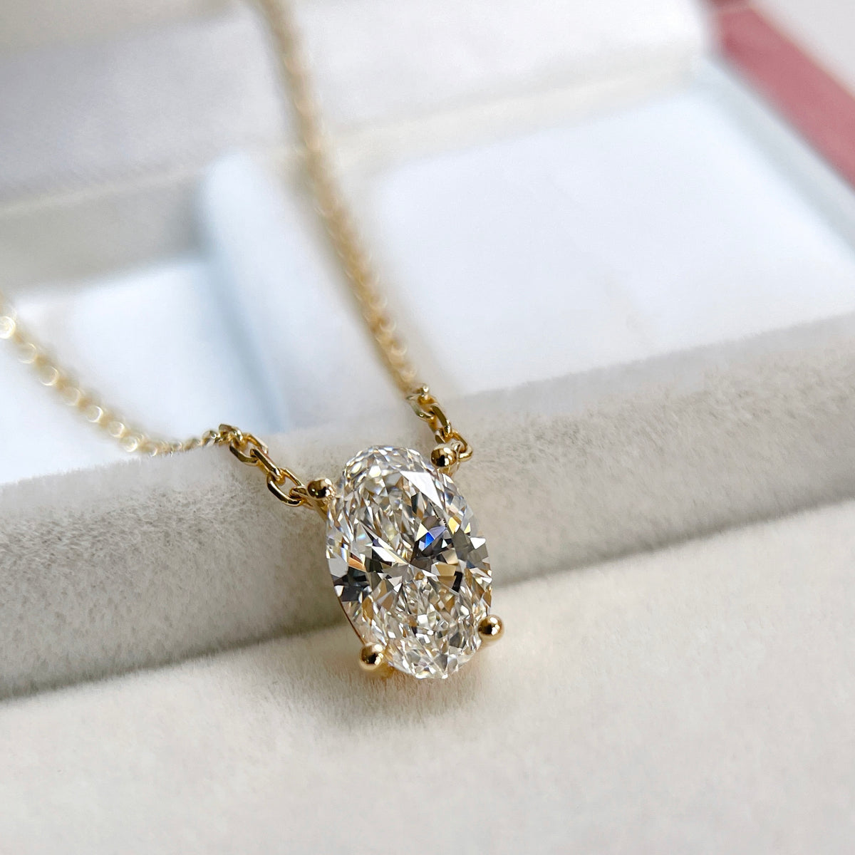 IGI certified 1.5 carat oval lab-grown diamond necklace in 18K yellow gold