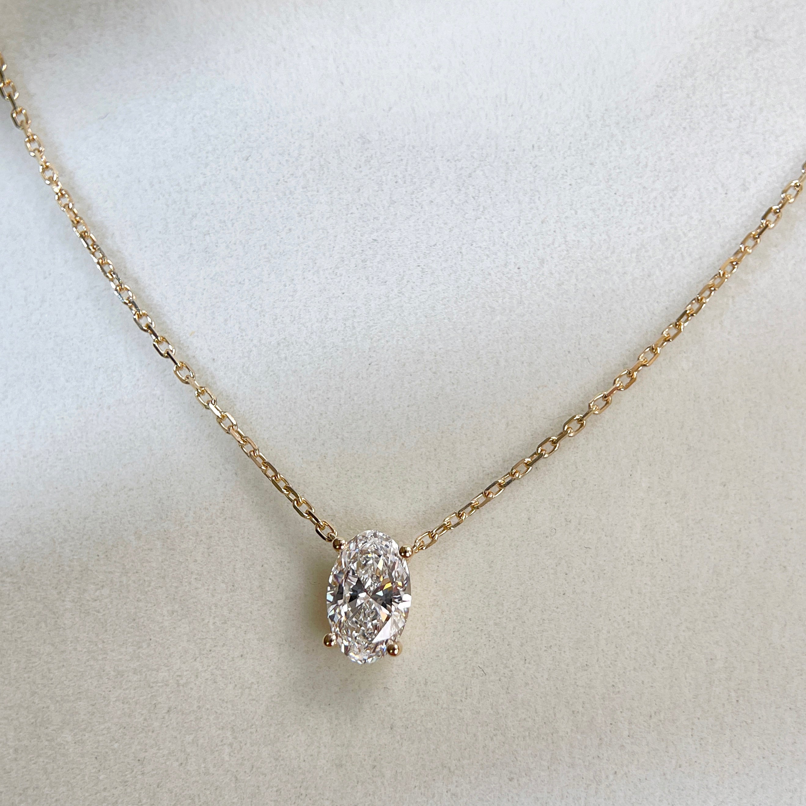 Oval lab-grown diamond necklace displayed at full length