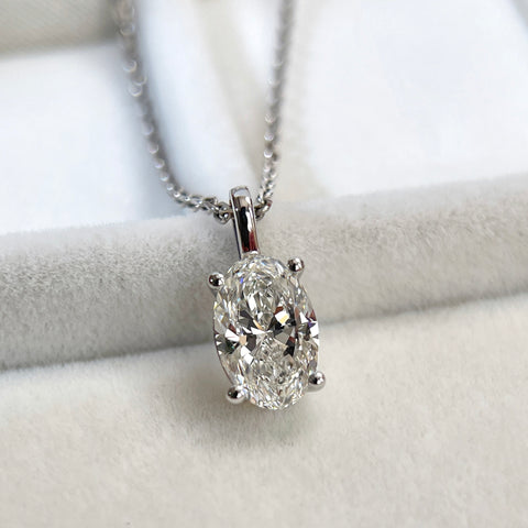 Close-up of an oval lab-grown diamond pendant shown on a chain for styling