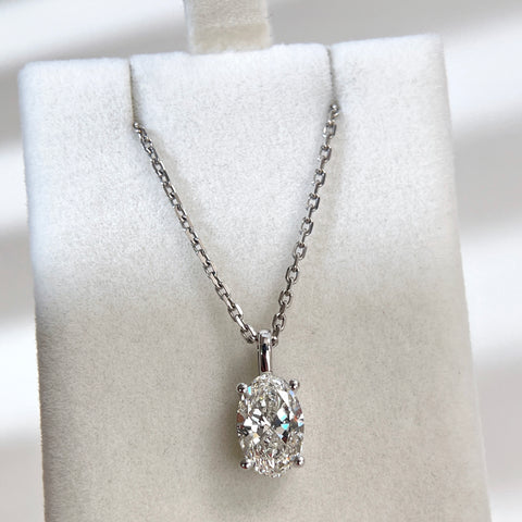 Alternate full display of a 1.5 carat oval lab-grown diamond pendant on a chain