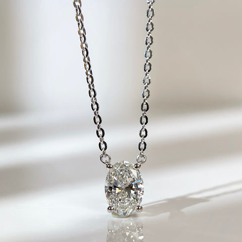 Front presentation of a 1.5 carat oval lab grown diamond necklace in S925 sterling silver.