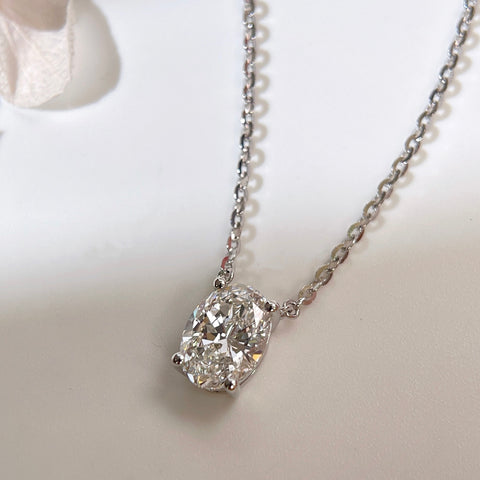 Diamond detail of a 1.5 carat oval lab grown diamond necklace in S925 sterling silver.