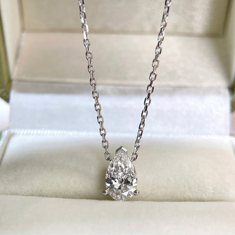 Front view of a 1.5 carat pear lab grown diamond necklace in 18K white gold.