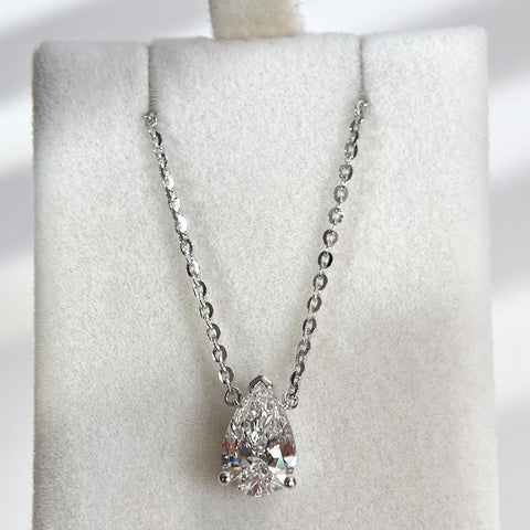 Full necklace display of a 1.5 carat pear lab grown diamond necklace in S925 sterling silver.