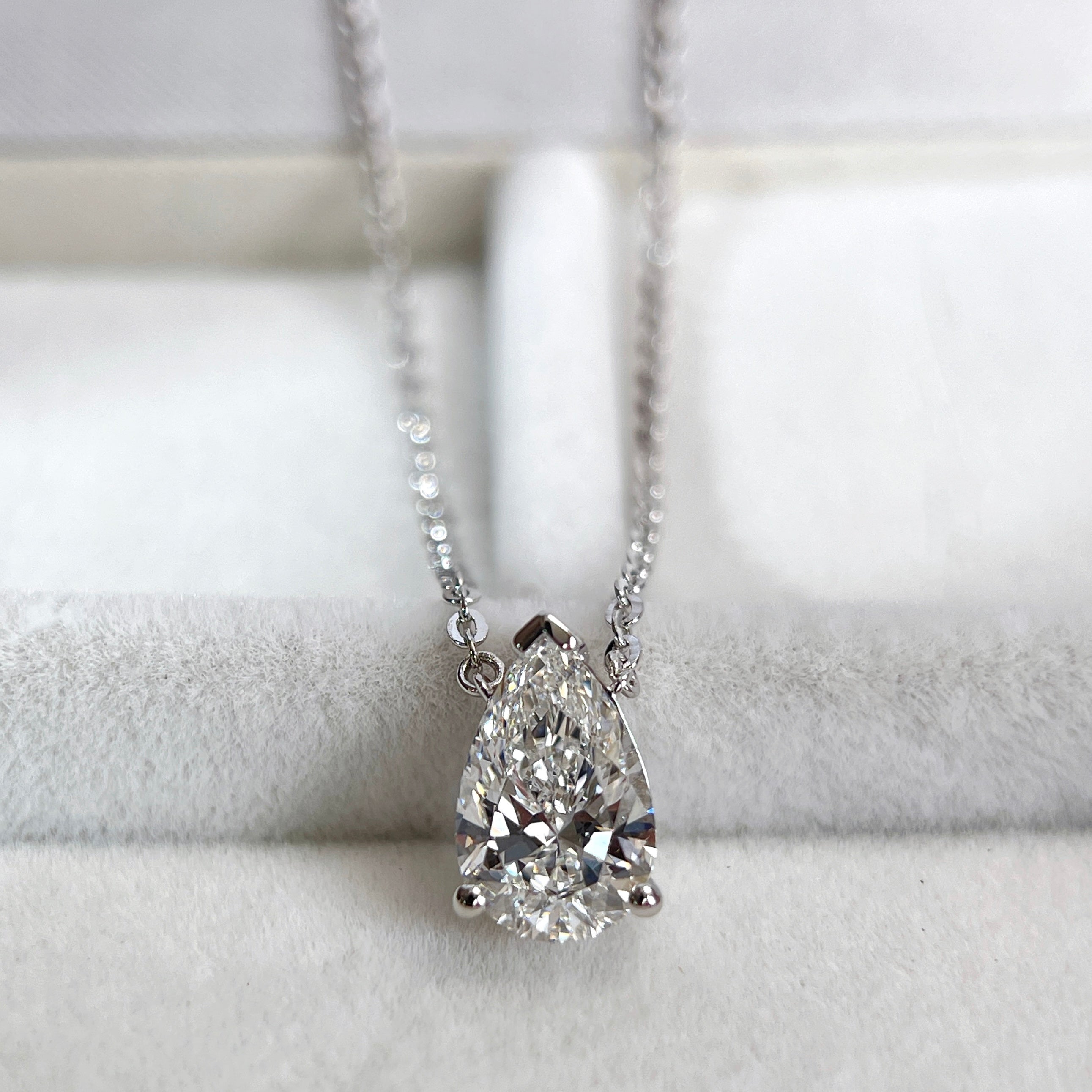 Diamond detail of a 1.5 carat pear lab grown diamond necklace in S925 sterling silver.