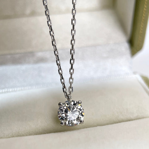 Front view of a 1.5 carat round lab grown diamond fixed pendant necklace in 18K white gold.