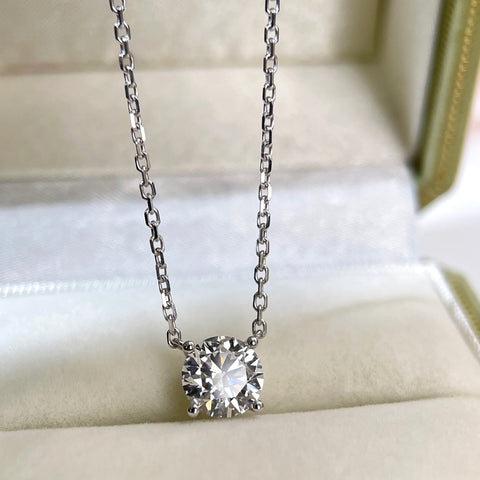 Front view of a 1.5 carat round lab grown diamond necklace in 18K white gold.