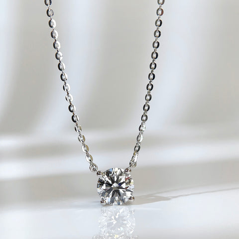 Front presentation of a 1.5 carat round lab grown diamond necklace in S925 sterling silver.