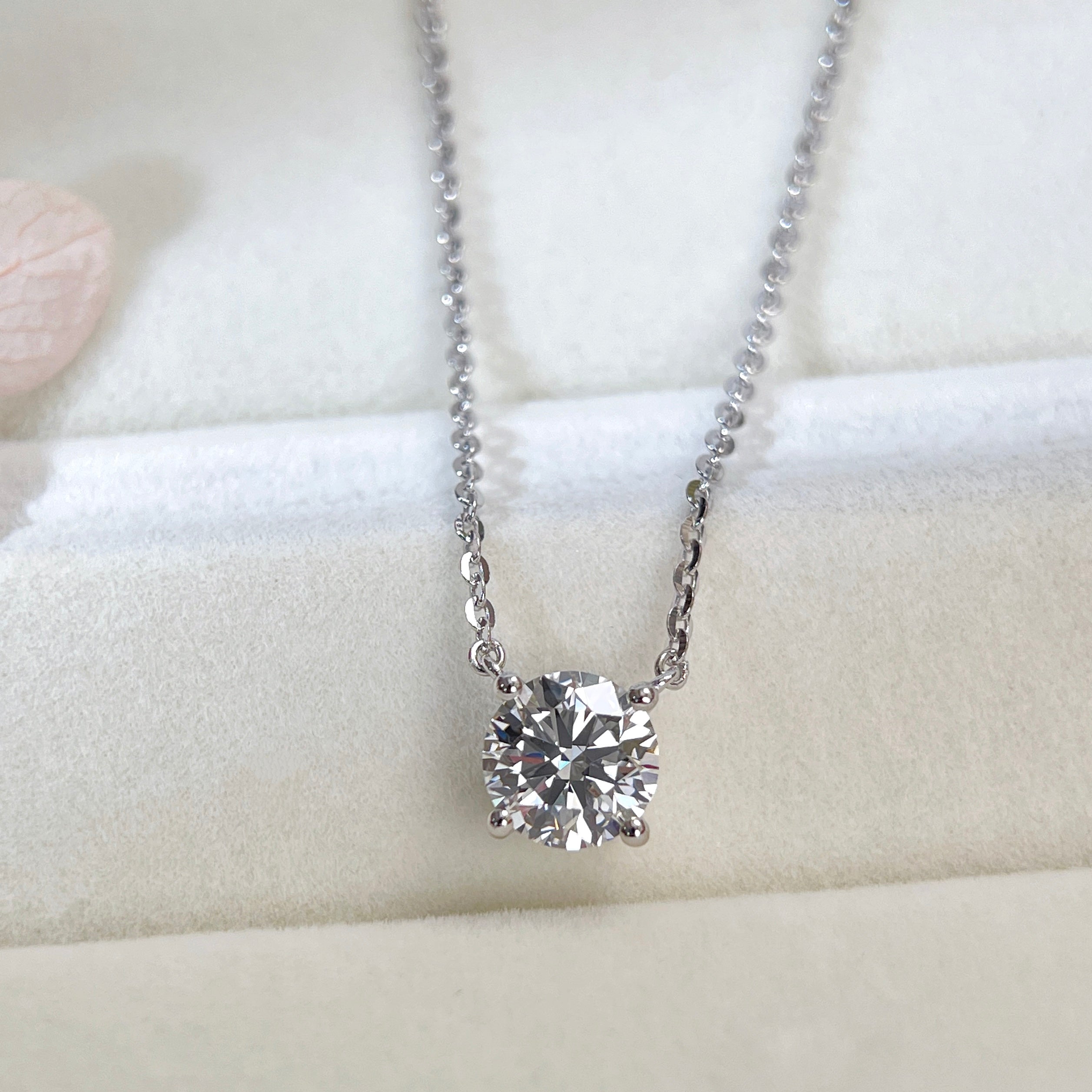 Front view of a 1.5 carat round lab grown diamond necklace in S925 sterling silver.