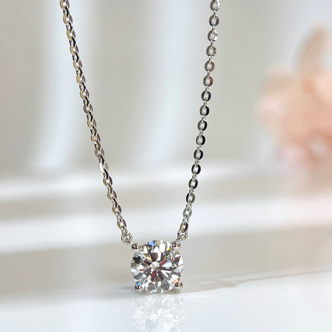 Diamond detail of a 1.5 carat D/VVS2 round lab grown diamond necklace in S925 sterling silver.