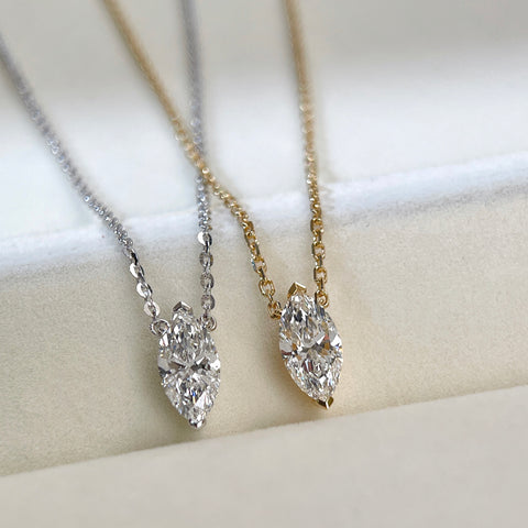 18K yellow gold and silver-tone marquise lab grown diamond necklace comparison.