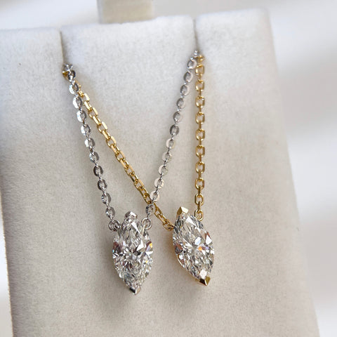 18K yellow gold and silver-tone marquise lab grown diamond necklace comparison.