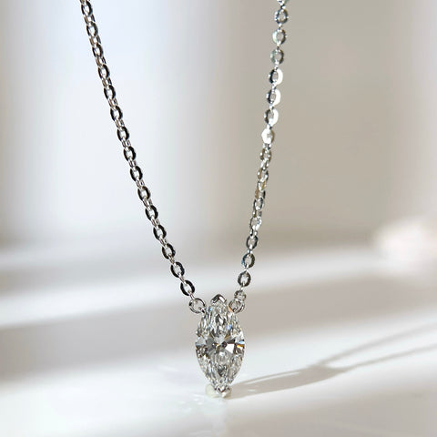 Front presentation of a 1 carat D/VVS2 marquise lab grown diamond necklace in S925 sterling silver.