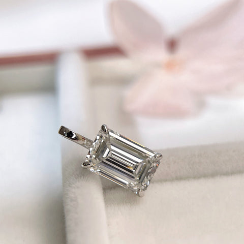 2 ct emerald-cut lab grown diamond pendant in 18K white gold with a four-prong setting