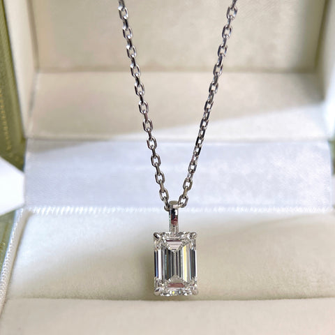 2 ct emerald-cut lab grown diamond 18K white gold pendant displayed with its separate chain