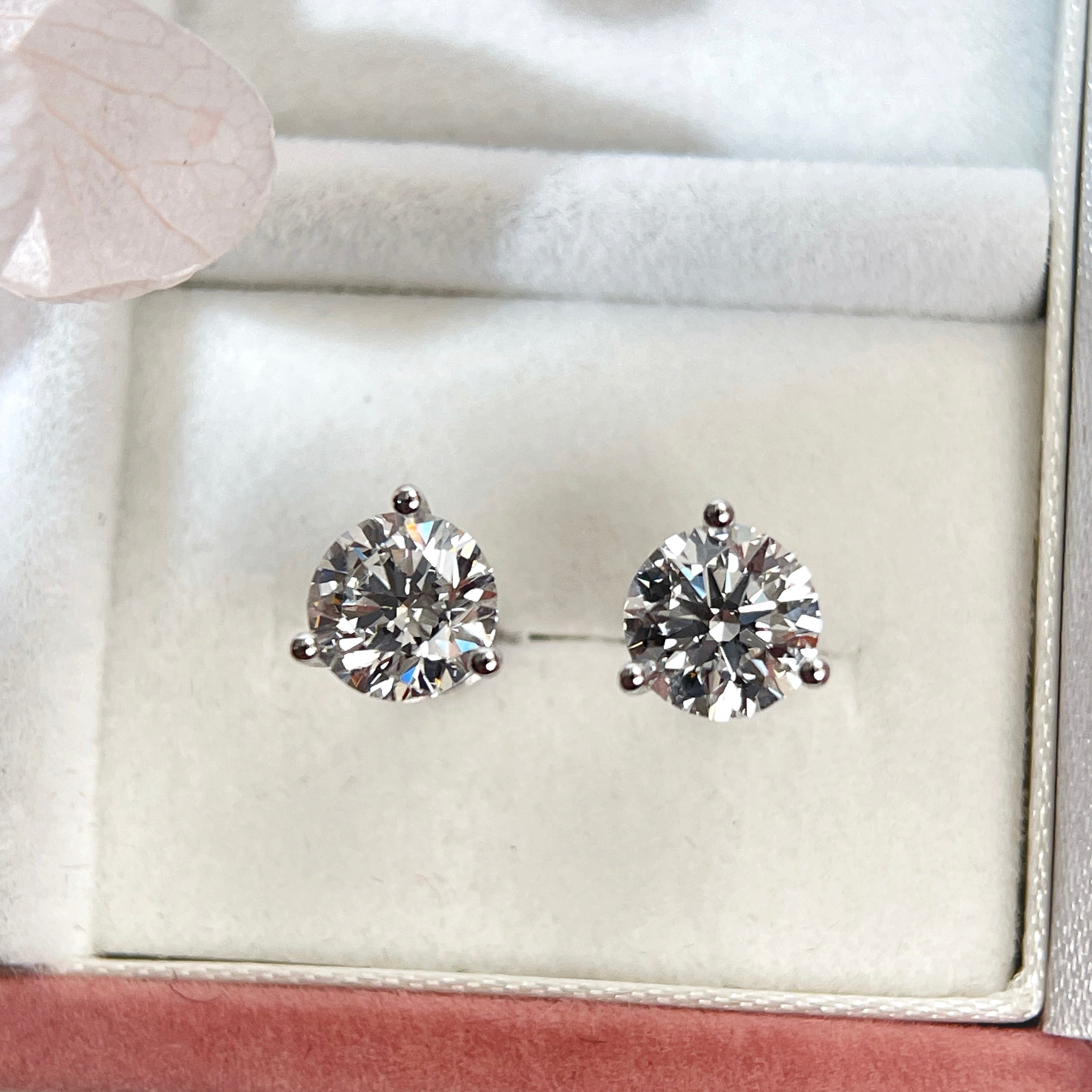 Wide jewelry box view of 2 CTW round lab grown diamond Martini stud earrings