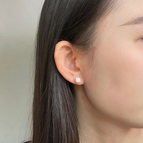 Opposite ear view of a 1 carat round lab grown diamond Martini stud earring