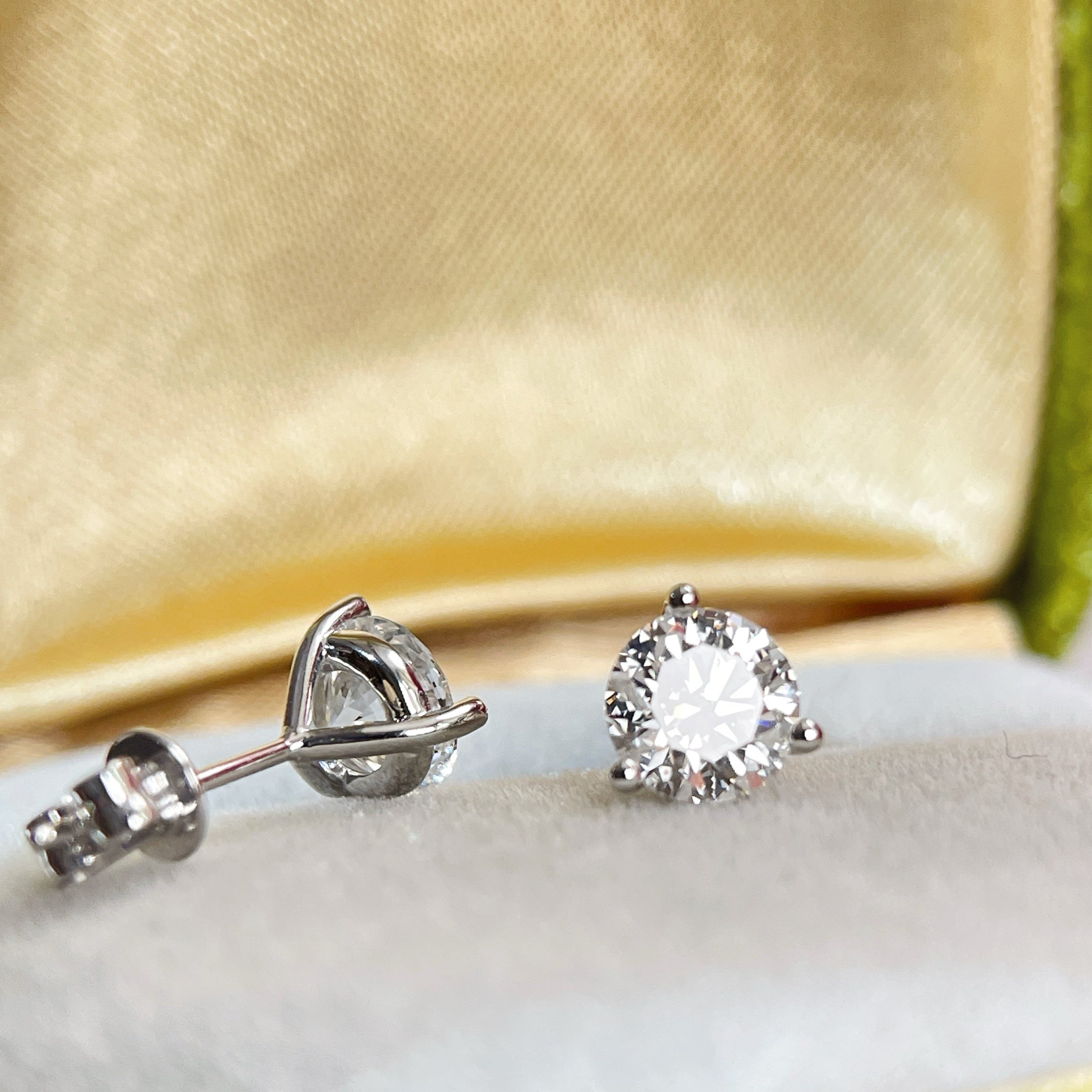 Side view showing the low-profile three-prong Martini setting in 14K white gold