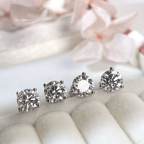 Display comparison of classic four-prong and three-prong Martini diamond studs