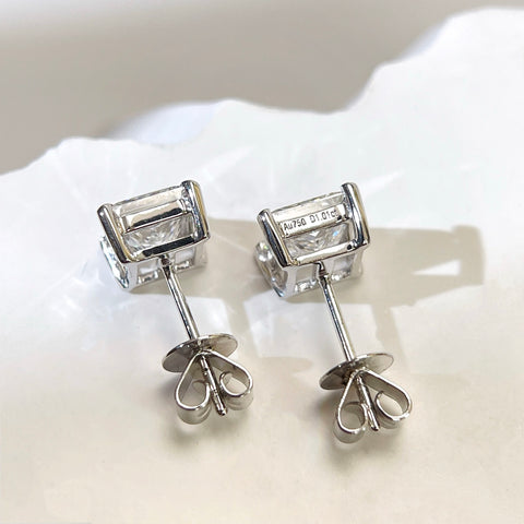Back view of 18K white gold princess-cut diamond stud earrings with push backs