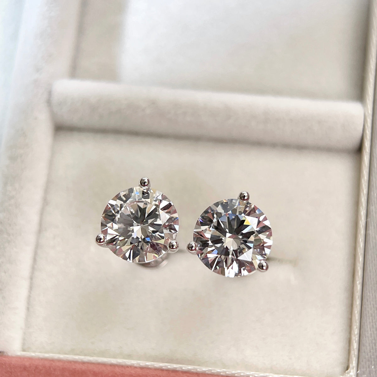 Front view of 3 CTW D VVS2 round lab grown diamond Martini stud earrings