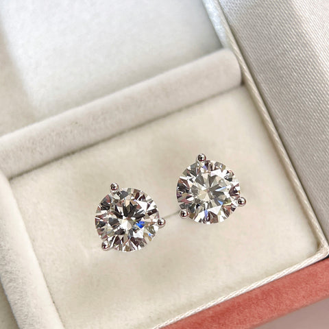 Angled jewelry box view of 3 CTW lab grown diamond Martini stud earrings