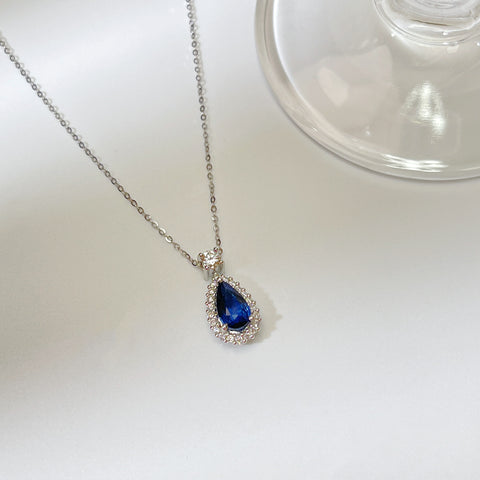 1.54 Carat Pear Blue Sapphire Necklace Elegant halo Setting  With Guild Certificate Intense Blue