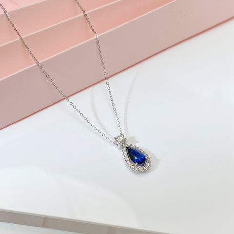 1.54 Carat Pear Blue Sapphire Necklace Elegant halo Setting  With Guild Certificate Intense Blue